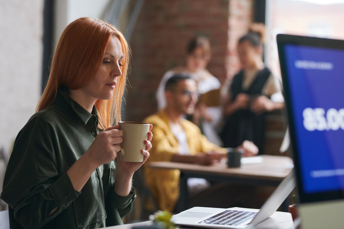 Woman Holding A Mug